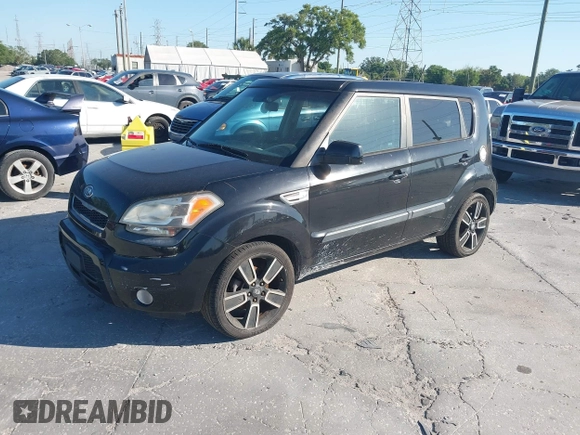 2011 Kia Soul + with VIN KNDJT2A22B7282062, listed as a IAAI auction lot 42035564 with 201,870 mi miles. Bid and sale history available at carsss.com. Image 2.