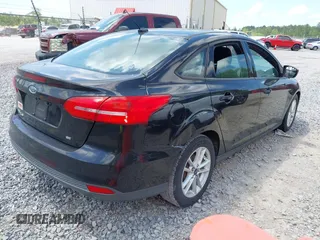 2017 Ford Focus SE with VIN 1FADP3F2XHL243371, listed as a IAAI auction lot 42147795 with 169,188 mi miles. Bid and sale history available at carsss.com. Image 4.