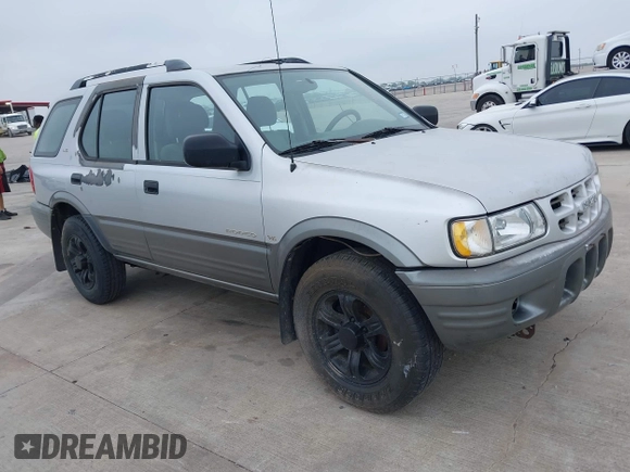 2000 Isuzu Rodeo S with VIN 4S2CK58W3Y4308219, listed as a IAAI auction lot 41939765 with 241,486 mi miles and . Bid and sale history available at DreamBid. Image 1.