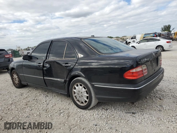 2001 Mercedes-Benz E-Class with VIN WDBJF70J51B372314, listed as a Copart auction lot 81494124 with 180,736 mi miles and Salvage Title. Bid and sale history available at carsss.com. Image 2.