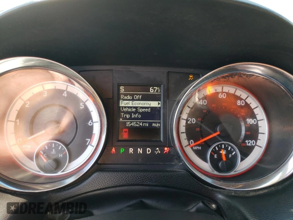 2014 Dodge Grand Caravan SXT z VIN 2C4RDGCG6ER427418, wystawiony jako Copart lot #58804395 z przebiegiem 154 524 mil mil oraz Tytuł czysty. Historia ofert i sprzedaży dostępna na DreamBid. Obrazek 9.