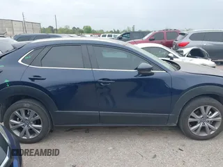 2023 Mazda CX-30 S Carbon Edition with VIN 3MVDMBCM1PM520066, listed as a IAAI auction lot 41877916 with 22,973 mi miles and . Bid and sale history available at carsss.com. Image 13.