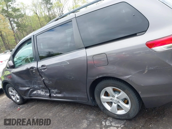 2014 Toyota Sienna LE AAS with VIN 5TDKK3DC3ES506466, listed as a IAAI auction lot 41908023 with 118,297 mi miles and . Bid and sale history available at carsss.com. Image 14.