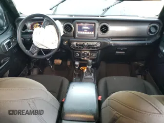 2022 Jeep Wrangler Unlimited High Tide with VIN 1C4HJXDG1NW134486, listed as a Copart auction lot 75280764 with 61,282 mi miles and Salvage Title. Bid and sale history available at DreamBid. Image 8.