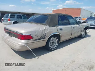 1997 Mercury Grand Marquis LS with VIN 2MELM75W3VX707138, listed as a IAAI auction lot 40055743 with 198,489 mi miles and . Bid and sale history available at DreamBid. Image 4.
