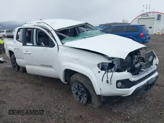 2023 Toyota Tacoma SR with VIN 3TYCZ5AN7PT170149, listed as a IAAI auction lot 41911619 with 41,991 mi miles and . Bid and sale history available at DreamBid. Image 1.