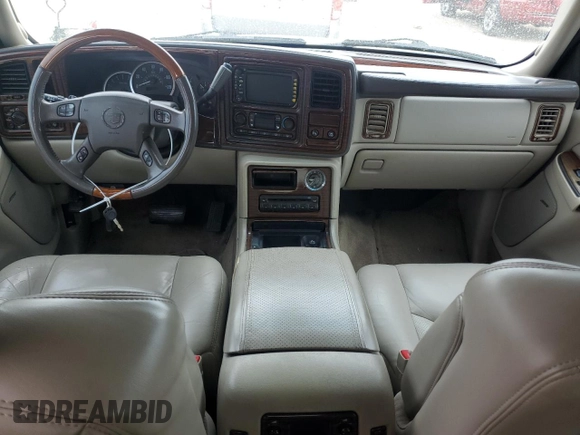 2003 Cadillac Escalade z VIN 1GYEK63N73R277166, wystawiony jako Copart lot #51797955 z przebiegiem 374 735 mil mil oraz Czysty tytuł • Clean title. Historia ofert i sprzedaży dostępna na DreamBid. Obrazek 8.