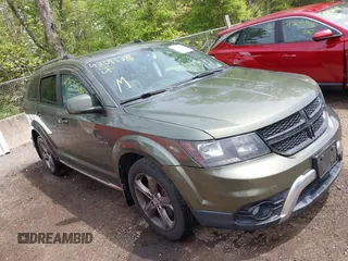 2017 Dodge Journey Crossroad Plus z VIN 3C4PDCGB4HT516369, wystawiony jako IAAI lot #42085388 z przebiegiem 159 257 mil mil oraz . Historia ofert i sprzedaży dostępna na DreamBid. Obrazek 1.