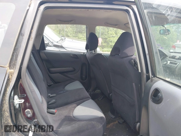 2007 Honda Fit with VIN JHMGD38437S014676, listed as a IAAI auction lot 42698451 with 288,354 mi miles and . Bid and sale history available at DreamBid. Image 8.