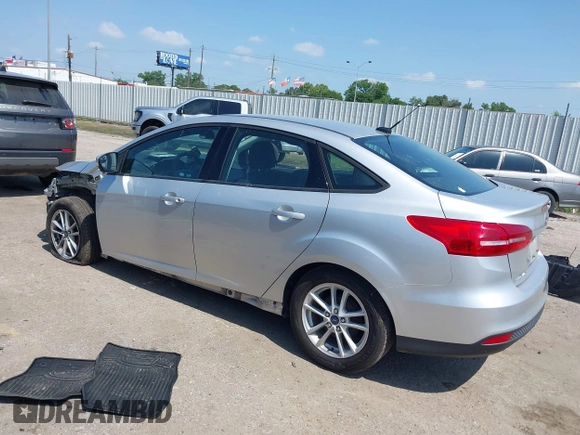 2017 Ford Focus SE with VIN 1FADP3F2XHL256136, listed as a IAAI auction lot 42215479 with 89,945 mi miles and . Bid and sale history available at DreamBid. Image 3.
