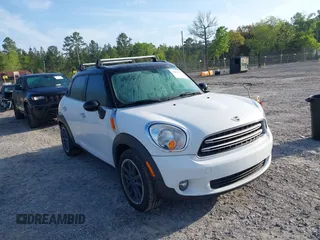 2016 MINI Countryman z VIN WMWZB3C51GWR48695, wystawiony jako IAAI lot #41999871 z przebiegiem 86 407 mil mil oraz . Historia ofert i sprzedaży dostępna na DreamBid. Obrazek 1.