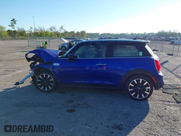 2020 MINI Hardtop Cooper S z VIN WMWXR5C09L2M32640, wystawiony jako IAAI lot #41463311 z przebiegiem 62 050 mil mil oraz . Historia ofert i sprzedaży dostępna na DreamBid. Obrazek 13.