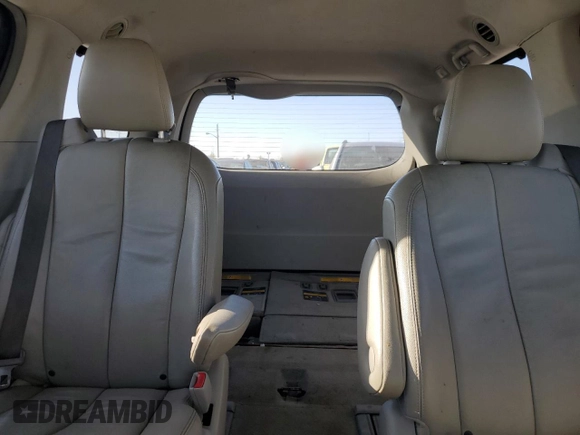 2014 Toyota Sienna Limited z VIN 5TDDK3DC5ES074424, wystawiony jako Copart lot #52831905 z przebiegiem 188 531 mil mil oraz Szkoda całkowita • Salvage title. Historia ofert i sprzedaży dostępna na DreamBid. Obrazek 10.