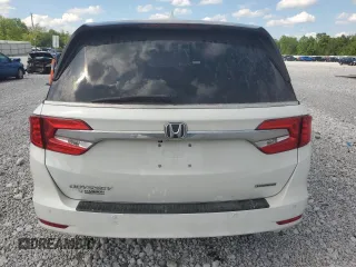 2020 Honda Odyssey Touring z VIN 5FNRL6H86LB036888, wystawiony jako Copart lot #58781675 z przebiegiem 130 329 mil mil oraz Szkoda całkowita • Salvage title. Historia ofert i sprzedaży dostępna na DreamBid. Obrazek 6.