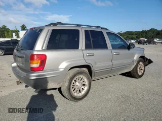 2002 Jeep Grand Cherokee Limited with VIN 1J4GX58S32C149852, listed as a Copart auction lot 71655864 with 190,918 mi miles and Salvage Title. Bid and sale history available at DreamBid. Image 3.