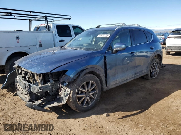 2018 Mazda CX-5 Grand Touring with VIN JM3KFBDM9J0323388, listed as a Copart auction lot 47628135 with 102,098 mi miles and Salvage Title. Bid and sale history available at carsss.com. Image 1.
