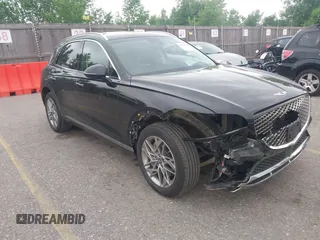 2025 Genesis GV70 2.5T z VIN KMUMADTB7SU199933, wystawiony jako IAAI lot #42500513 z przebiegiem 15 384 mil mil oraz . Historia ofert i sprzedaży dostępna na DreamBid. Obrazek 1.