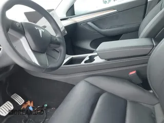 2023 Tesla Model Y Performance with VIN 7SAYGDEF4PF797192, listed as a IAAI auction lot 41550259 with 13,312 mi miles and . Bid and sale history available at DreamBid. Image 5.