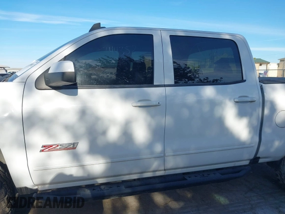 2017 Chevrolet Silverado 1500 LT with VIN 3GCUKREC4HG466329, listed as a IAAI auction lot 41305052 with 57,844 mi miles and . Bid and sale history available at DreamBid. Image 13.