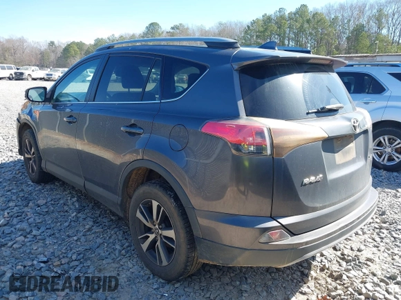 2018 Toyota RAV4 XLE with VIN 2T3WFREV2JW450019, listed as a IAAI auction lot 41704084 with 257,737 mi miles. Bid and sale history available at carsss.com. Image 3.