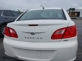 2010 Chrysler Sebring Touring with VIN 1C3CC4FB5AN229593, listed as a IAAI auction lot 41971326 with 144,561 mi miles. Bid and sale history available at carsss.com. Image 16.