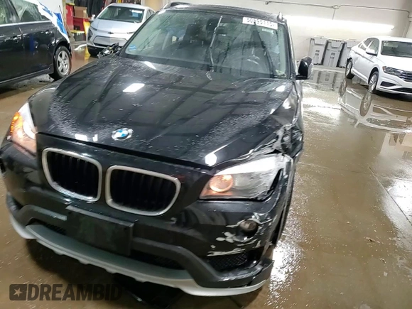 2015 BMW X1 xDrive28i z VIN WBAVL1C51FVY28965, wystawiony jako Copart lot #50895115 z przebiegiem 53 133 mil mil oraz Szkoda całkowita • Salvage title. Historia ofert i sprzedaży dostępna na DreamBid. Obrazek 13.