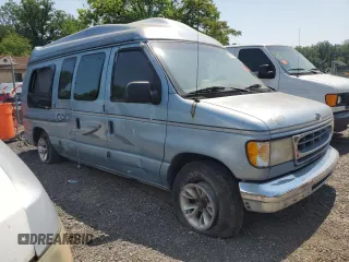 2000 Ford Econoline Cargo Recreational with VIN 1FDRE14L5YHA56690, listed as a Copart auction lot 58926155 with 162,797 mi miles and Salvage title. Bid and sale history available at DreamBid. Image 4.