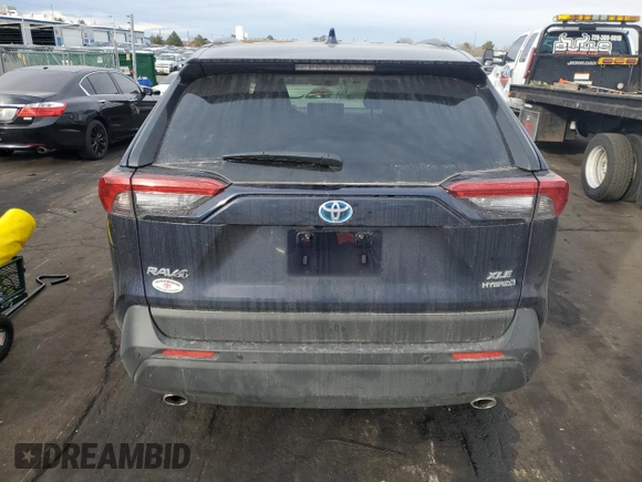 2024 Toyota RAV4 Hybrid XLE Premium with VIN JTMB6RFV4RD137902, listed as a Copart auction lot 86013364 with 9,330 mi miles and Salvage Title. Bid and sale history available at DreamBid. Image 6.