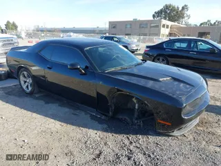 2021 Dodge Challenger SXT with VIN 2C3CDZAG9MH630736, listed as a IAAI auction lot 41633520 with 62,895 mi miles. Bid and sale history available at carsss.com. Image 1.
