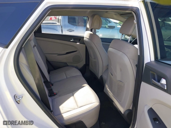 2016 Hyundai Tucson SE with VIN KM8J23A48GU212421, listed as a IAAI auction lot 42072562 with 63,745 mi miles. Bid and sale history available at carsss.com. Image 8.