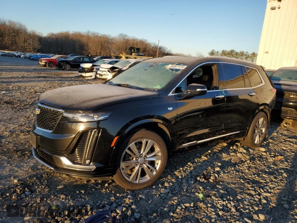 2023 Cadillac XT6 FWD Premium Luxury z VIN 1GYKPCRS7PZ105628, wystawiony jako Copart lot #84841124 z przebiegiem Nie podano mil oraz Szkoda całkowita • Salvage title. Historia ofert i sprzedaży dostępna na DreamBid. Obrazek 1.