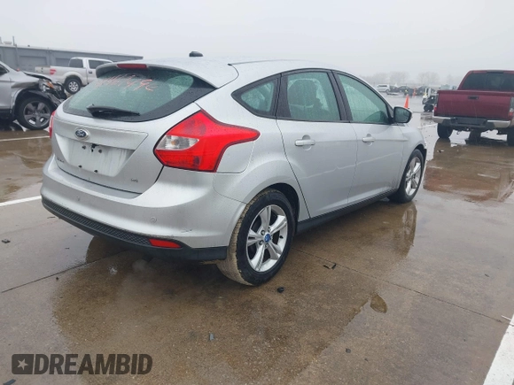 2013 Ford Focus SE with VIN 1FADP3K27DL258264, listed as a IAAI auction lot 41469494 with 184,869 mi miles. Bid and sale history available at carsss.com. Image 4.
