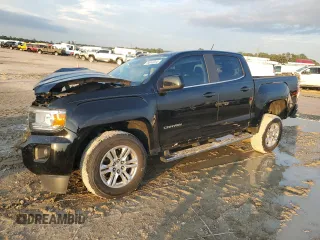 2020 GMC Canyon 2WD SLE with VIN 1GTG5CEN2L1165889, listed as a Copart auction lot 78814914 with 31,050 mi miles and Salvage Title. Bid and sale history available at carsss.com. Image 1.