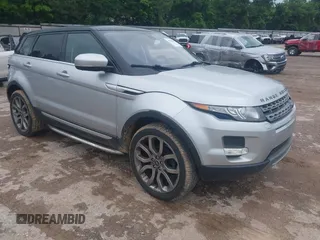 2013 Land Rover Range Rover Evoque Prestige Premium z VIN SALVV2BG1DH798053, wystawiony jako IAAI lot #42178057 z przebiegiem 154 820 mil mil oraz . Historia ofert i sprzedaży dostępna na DreamBid. Obrazek 1.