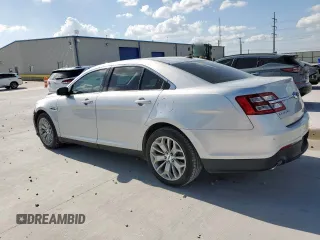 2017 Ford Taurus Limited with VIN 1FAHP2F87HG120703, listed as a Copart auction lot 62123765 with 148,756 mi miles and Salvage title. Bid and sale history available at DreamBid. Image 2.