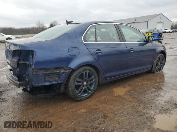 2006 Volkswagen Jetta z VIN 3VWRG81K06M785950, wystawiony jako Copart lot #87218214 z przebiegiem 129 955 mil mil oraz Szkoda całkowita • Salvage title. Historia ofert i sprzedaży dostępna na DreamBid. Obrazek 3.