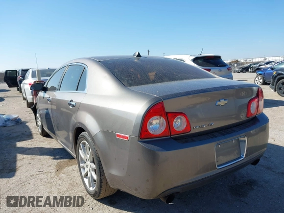 2012 Chevrolet Malibu LTZ with VIN 1G1ZG5E74CF133103, listed as a IAAI auction lot 41640075 with 173,692 mi miles and . Bid and sale history available at DreamBid. Image 3.
