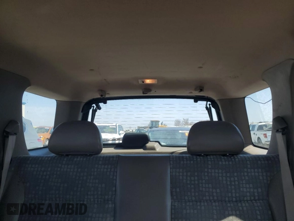 2002 Ford Escape XLS Choice with VIN 1FMYU02112KB00947, listed as a Copart auction lot 48948855 with 223,287 mi miles and Salvage title. Bid and sale history available at DreamBid. Image 10.