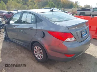 2014 Hyundai Accent GLS with VIN KMHCT4AE9EU614191, listed as a IAAI auction lot 37899279 with 144,247 mi miles. Bid and sale history available at carsss.com. Image 3.