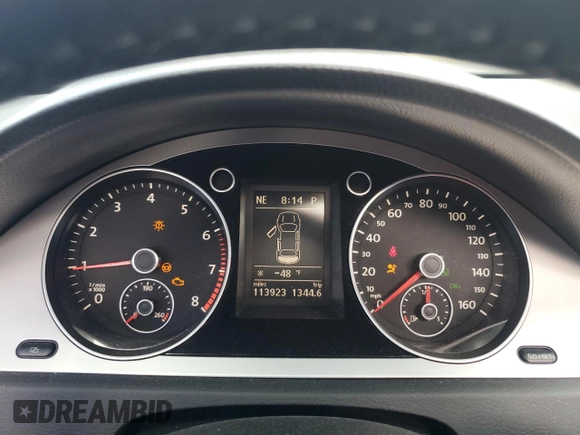 2009 Volkswagen Passat Komfort with VIN WVWXK73C09E140427, listed as a Copart auction lot 60374115 with 113,923 mi miles and Salvage title. Bid and sale history available at DreamBid. Image 9.