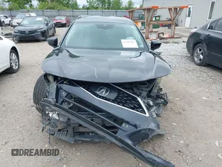 2021 Acura TLX Technology with VIN 19UUB5F42MA009559, listed as a IAAI auction lot 42245295 with 59,902 mi miles and . Bid and sale history available at DreamBid. Image 12.