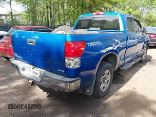 2008 Toyota Tundra 4WD Truck with VIN 5TBBV54198S492975, listed as a IAAI auction lot 42145763 with 281,934 mi miles. Bid and sale history available at carsss.com. Image 4.