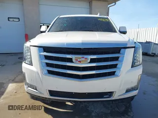 2015 Cadillac Escalade ESV Premium z VIN 1GYS4TKJ9FR700022, wystawiony jako IAAI lot #41748188 z przebiegiem 166 416 mil mil oraz . Historia ofert i sprzedaży dostępna na DreamBid. Obrazek 12.