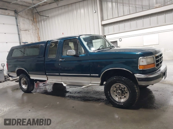 1997 Ford F-250 HD with VIN 1FTHX26G0VEB12354, listed as a IAAI auction lot 42033876 with Not Provided miles. Bid and sale history available at carsss.com. Image 13.