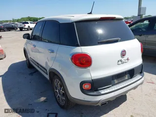 2014 FIAT 500L Trekking with VIN ZFBCFADH2EZ007586, listed as a IAAI auction lot 42040589 with 69,793 mi miles. Bid and sale history available at carsss.com. Image 3.