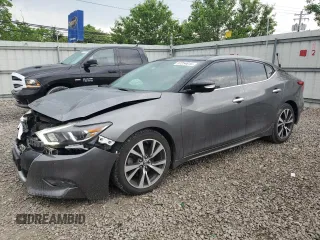2017 Nissan Maxima Platinum with VIN 1N4AA6AP7HC384827, listed as a Copart auction lot 57254815 with 136,572 mi miles and Salvage title. Bid and sale history available at DreamBid. Image 1.