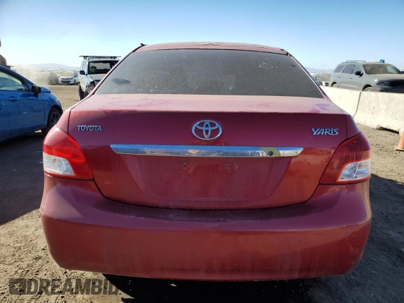 2012 Toyota Yaris with VIN JTDBT4K37C1419301, listed as a Copart auction lot 46705025 with 201,884 mi miles and Salvage Title. Bid and sale history available at DreamBid. Image 6.