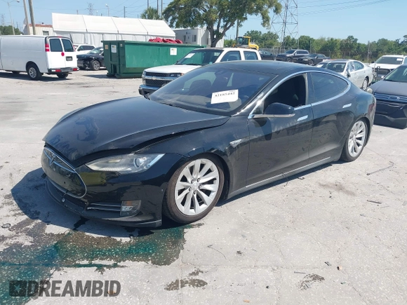 2014 Tesla Model S P85D with VIN 5YJSA1H25EFP65571, listed as a IAAI auction lot 42185442 with 115,990 mi miles and . Bid and sale history available at DreamBid. Image 18.