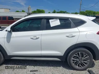 2019 Hyundai Tucson Sport with VIN KM8J33AL5KU066119, listed as a IAAI auction lot 42041651 with 60,281 mi miles. Bid and sale history available at carsss.com. Image 14.