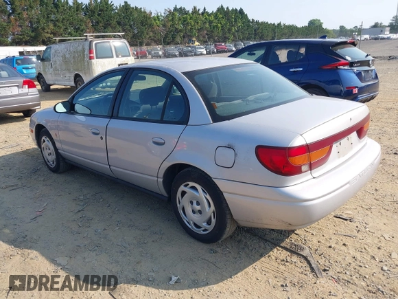 2001 Saturn SL z VIN 1G8ZK52771Z269242, wystawiony jako IAAI lot #42425226 z przebiegiem 129 539 mil mil oraz . Historia ofert i sprzedaży dostępna na DreamBid. Obrazek 3.